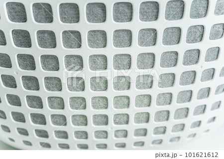 Dirty - dusty air purifier filter in living room. Air purifier machine lid or grille filter fully with a dust and polluted particle. Dirty - dusty air purifier filter in living room. Air purifier machine lid or grille filter fully with a dust and polluted particle. 101621612
