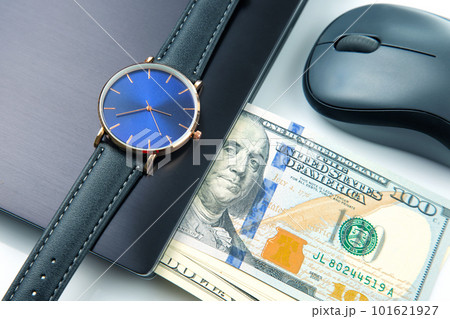 Dollars, wristwatch near laptop with mouse. Business online. Working time for working with laptop. Dollars, wristwatch near laptop with mouse. Business online. Working time for working with laptop. 101621927