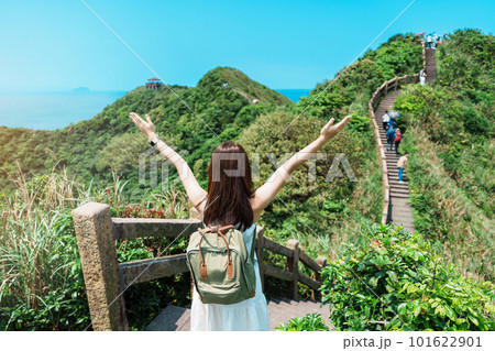 woman traveler visiting in Taiwan, Tourist with backpack sightseeing in Bitou Cape Hiking Trail, New Taipei City. landmark and popular attractions near Taipei. Asia Travel concept woman traveler visiting in Taiwan, Tourist with backpack sightseeing in Bitou Cape Hiking Trail, New Taipei City. landmark and popular attractions near Taipei. Asia Travel concept 101622901