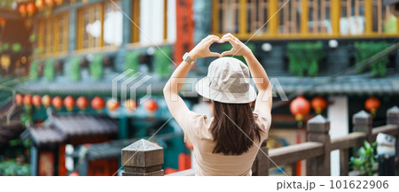 woman traveler visiting in Taiwan, Tourist with hat sightseeing in Jiufen Old Street village with Tea House background. landmark and popular attractions near Taipei city . Travel and Vacation concept woman traveler visiting in Taiwan, Tourist with hat sightseeing in Jiufen Old Street village with Tea House background. landmark and popular attractions near Taipei city . Travel and Vacation concept 101622906