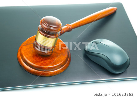 court and auction gavel on laptop background. online law and consultation. court and auction gavel on laptop background. online law and consultation. 101623262