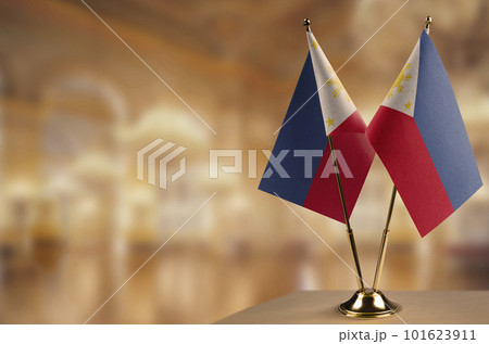 Small flags of the Philippines on an abstract blurry background 101623911