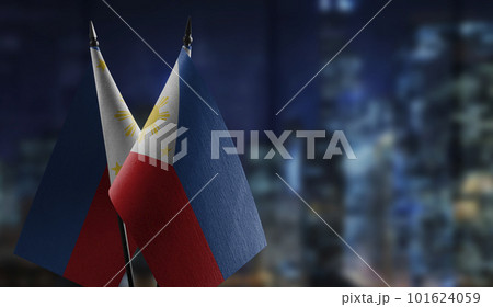 Small flags of the Philippines on an abstract blurry background 101624059