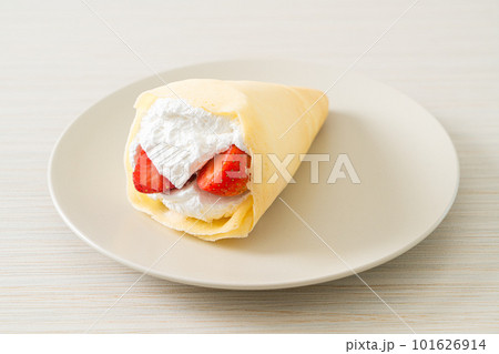 fresh strawberry cream crepe on plate fresh strawberry cream crepe on plate 101626914