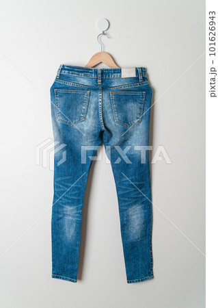 jeans trousers hanging on wall jeans trousers hanging on wall 101626943