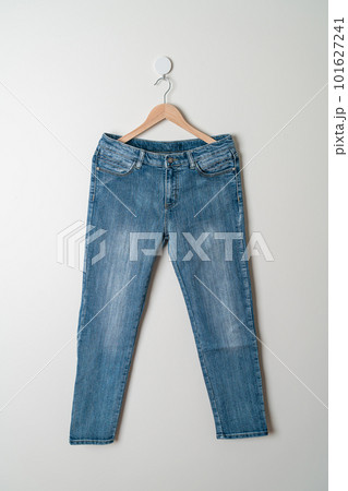 jeans trousers hanging on wall jeans trousers hanging on wall 101627241