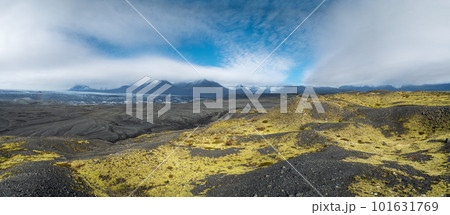 Iceland autumn tundra landscape near Haoldukvisl glacier, Iceland. Glacier tongue slides from the Vatnajokull icecap or Vatna Glacier near subglacial Esjufjoll volcano. Not far from Iceland Ring Road. Iceland autumn tundra landscape near Haoldukvisl glacier, Iceland. Glacier tongue slides from the Vatnajokull icecap or Vatna Glacier near subglacial Esjufjoll volcano. Not far from Iceland Ring Road. 101631769