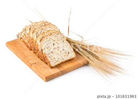 fresh bread and wheat on white 101631963