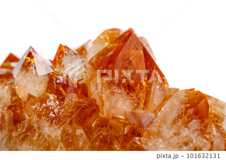 Macro mineral stone Citrine in rock in crystals on a white background Macro mineral stone Citrine in rock in crystals on a white background 101632131