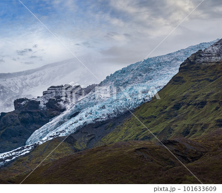 View from highway road during auto trip in Iceland. Spectacular Icelandic landscape with scenic nature View from highway road during auto trip in Iceland. Spectacular Icelandic landscape with scenic nature 101633609