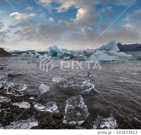 Jokulsarlon glacial lake, lagoon with ice blocks, Iceland. Situated near the edge of the Atlantic Ocean at the head of the Breidamerkurjokull glacier, Vatnajokull icecap or Vatna Glacier. Jokulsarlon glacial lake, lagoon with ice blocks, Iceland. Situated near the edge of the Atlantic Ocean at the head of the Breidamerkurjokull glacier, Vatnajokull icecap or Vatna Glacier. 101633613