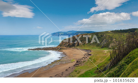 Beach Azkorri (or Gorrondatxe) in Getxo town, Biscay bay (Spain). Summer Atlantic coast landscape. 101635620