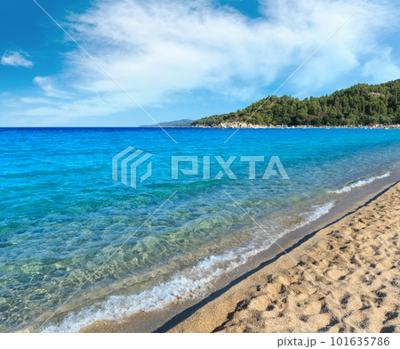 Aegean sea coast landscape with aquamarine water, view from Armenistis beach (Chalkidiki, Greece). Aegean sea coast landscape with aquamarine water, view from Armenistis beach (Chalkidiki, Greece). 101635786