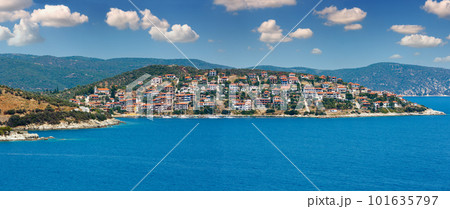 Summer Aegean sea and Pyrgadikia village coast view (Sithonia, Halkidiki, Greece). Summer Aegean sea and Pyrgadikia village coast view (Sithonia, Halkidiki, Greece). 101635797