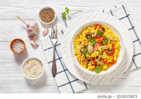 Chicken Paella with mushrooms, red pepper, spices 101635825