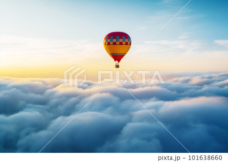 Hot air balloon flying high above the clouds in blue and yellow sky. Generative AI 101638660