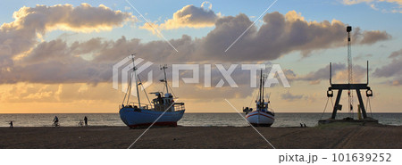 Fishing boats at sunset. Slettestrand. 101639252