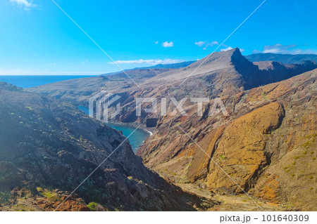 A bird's-eye view of the slopes of the mountains. Sunny day. A bird's-eye view of the slopes of the mountains. Sunny day. 101640309