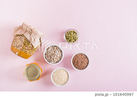 Sunflower, Flax, Sesame, Pumpkin Seeds and Honey for a Healthy Immune Blend top view 101640997