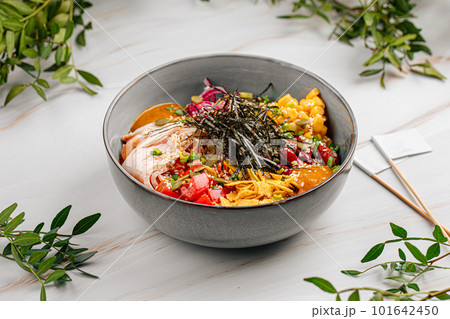 Portion of sous vide chicken poke bowl 101642450