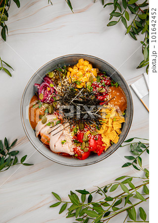 Portion of sous vide chicken poke bowl 101642452