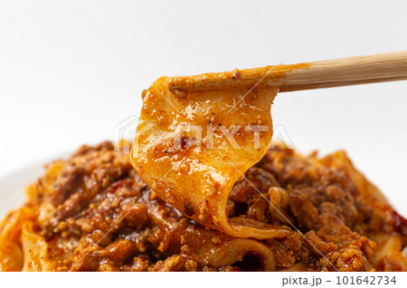 Fried noodles with mala sauce on white background 101642734