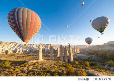 beautiful scenery flight of balloons in the mountains of Cappadocia in love valley beautiful scenery flight of balloons in the mountains of Cappadocia in love valley 101643476