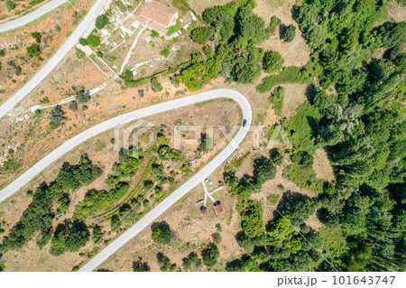 Meandering serpentine road in the mountain. Aerial view. Copter, drone view 101643747