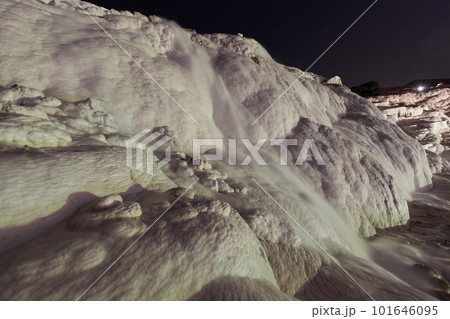 Pamukkale on the top with a view of the city of Denizli at night, Turkey. 101646095