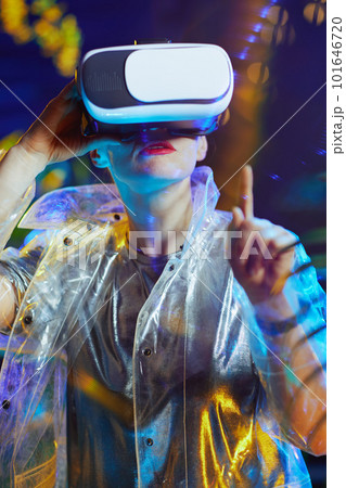 modern 40 years old woman in virtual reality in vr goggles 101646720