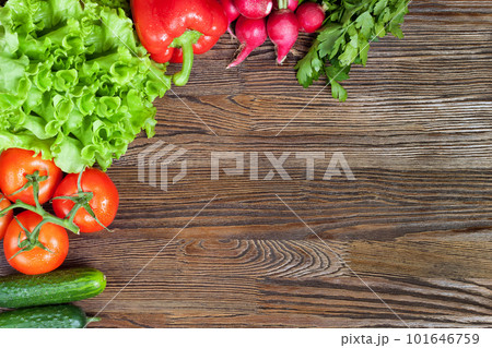 Vegetables on wooden background Vegetables on wooden background 101646759