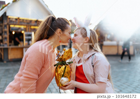 smiling modern mother and child at fair in city smiling modern mother and child at fair in city 101648172
