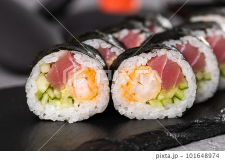 Sushi roll on dark background. Japanese and asian food concept 101648974