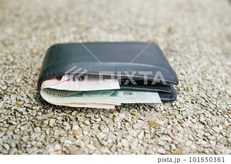 left wallet on a bench in the park left wallet on a bench in the park 101650361