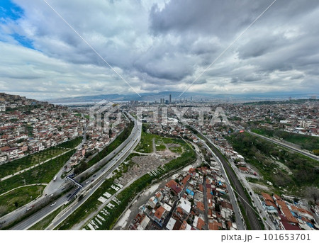 Aerial view of slums and skyscrapers in izmir cityscape on a cloudy day with izmir bay, alsancak harbor Aerial view of slums and skyscrapers in izmir cityscape on a cloudy day with izmir bay, alsancak harbor 101653701