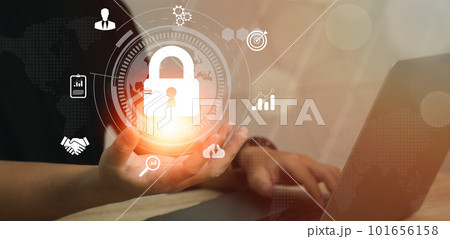 Technology and business. Businessman using computer laptop and smartphone to connecting and privacy locked blurred blue and dark background. Technology and business. Businessman using computer laptop and smartphone to connecting and privacy locked blurred blue and dark background. 101656158