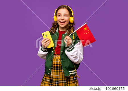 Girl holds small flag China 101660155