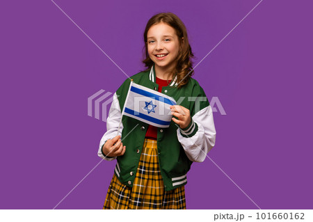 Girl holds small flag Israel Girl holds small flag Israel 101660162