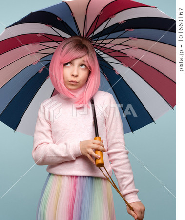 Teen girl in pink wig 101660167