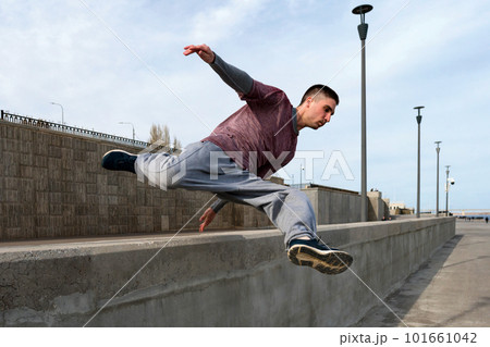 Man doing parkour. Extreme sports Man doing parkour. Extreme sports 101661042