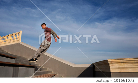 Man doing parkour. Free runner 101661073