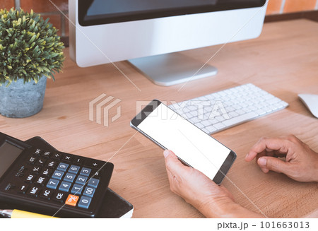 Businessmen use smartphones Businessmen use smartphones 101663013