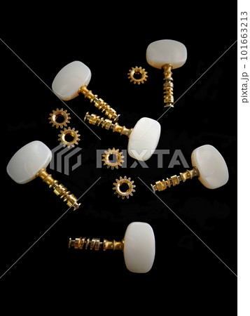close up shot of the separate parts of classical guitar tuning machine close up shot of the separate parts of classical guitar tuning machine 101663213