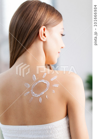 Skin care, woman use skin care products at home in light bathroom Skin care, woman use skin care products at home in light bathroom 101666984