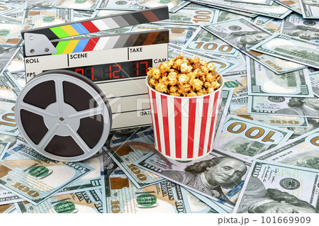 Clapperboard, film reel and popcorn on the dollars background, 3D rendering 101669909