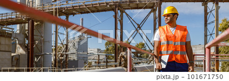 Industrial worker on his job at construction plant Industrial worker on his job at construction plant 101671750