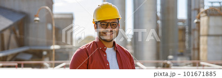 Young construction specialist working at industrial plant 101671885