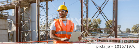 Worker with safety equipment working at heavy industry plant Worker with safety equipment working at heavy industry plant 101671976