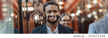 Multiethnic group of business people standing in office during break. Teamwork concept 101672186