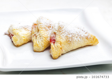 homemade puff pastry filled with strawberry jam 101674733